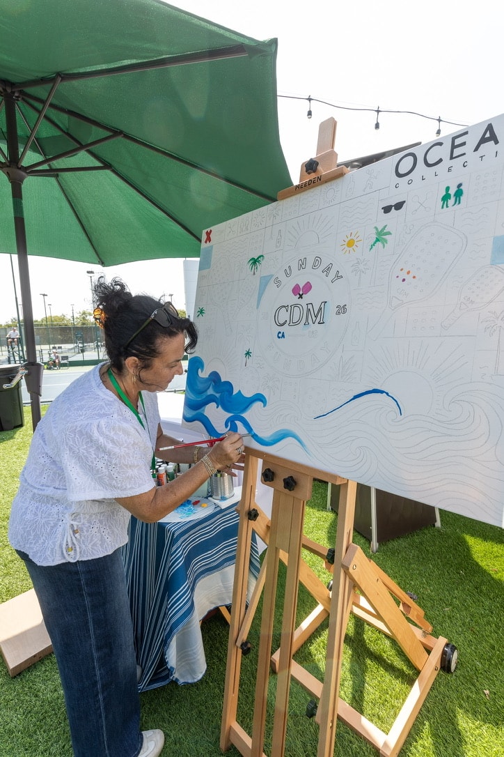 Shannon Paints easel setup at outdoor live event